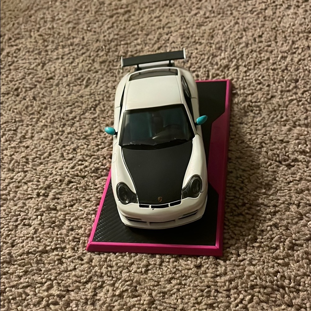 White and Black Porsche Model Car